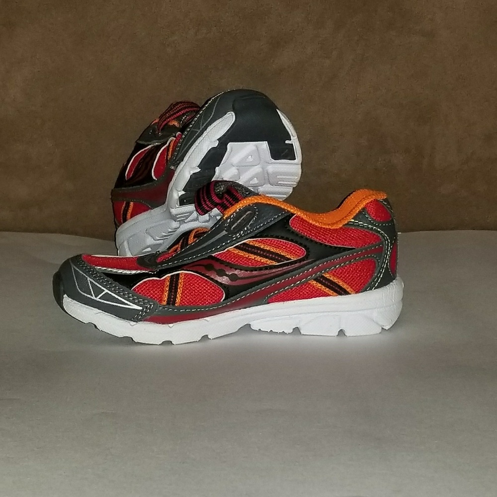 Never been worn cool kid Saucony sneakers